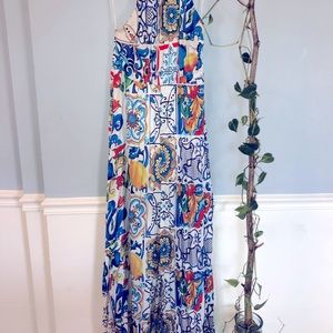 Beautiful Akira one piece jumper, Back cross belts and zipper. All pleated. M.